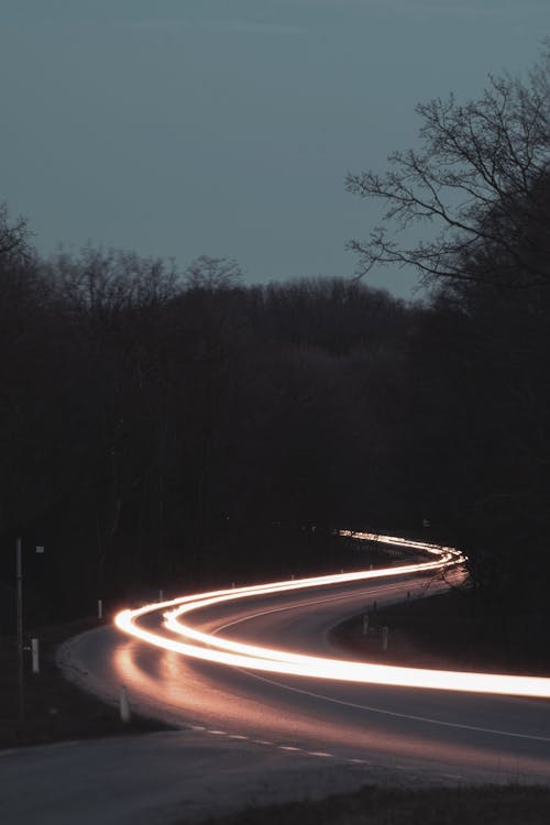 Time-Lapse Photography of Cars on the Road during Night Time