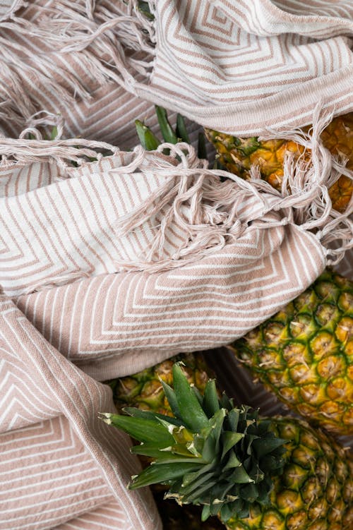 Free Pineapples in eco friendly bags Stock Photo