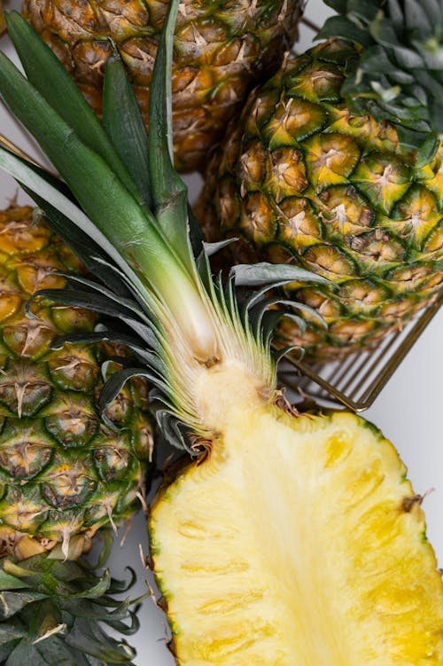 Ripe pineapples placed on table