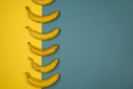 Backdrop of delicious fresh bananas in row