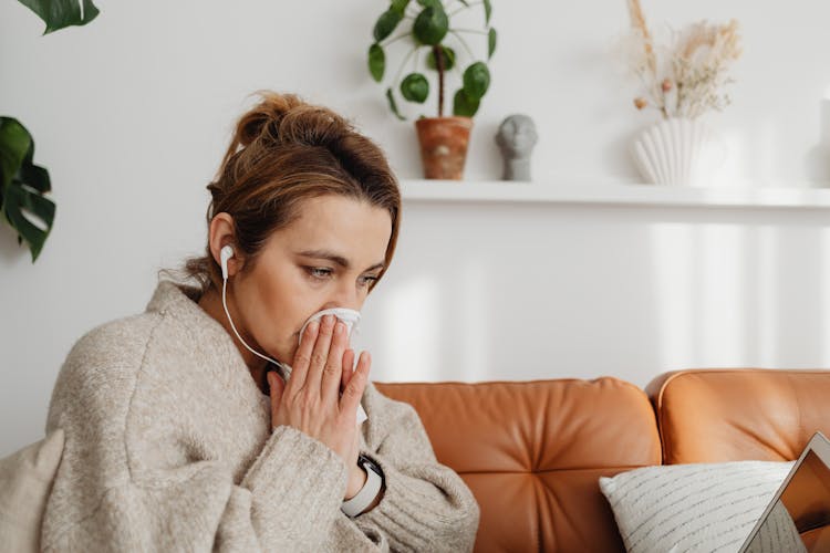 Woman Blowing Nose