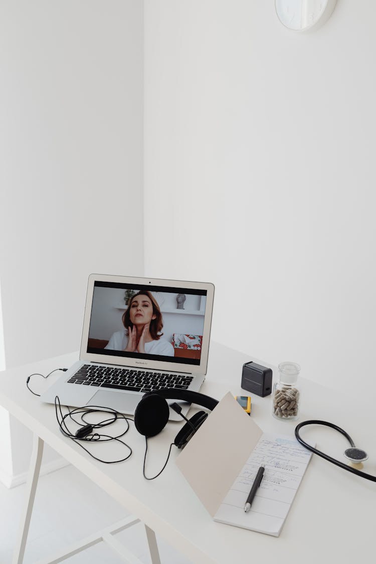 Woman On Laptop In Online Meeting