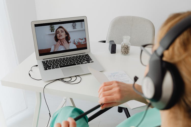 Woman Working During Online Meeting