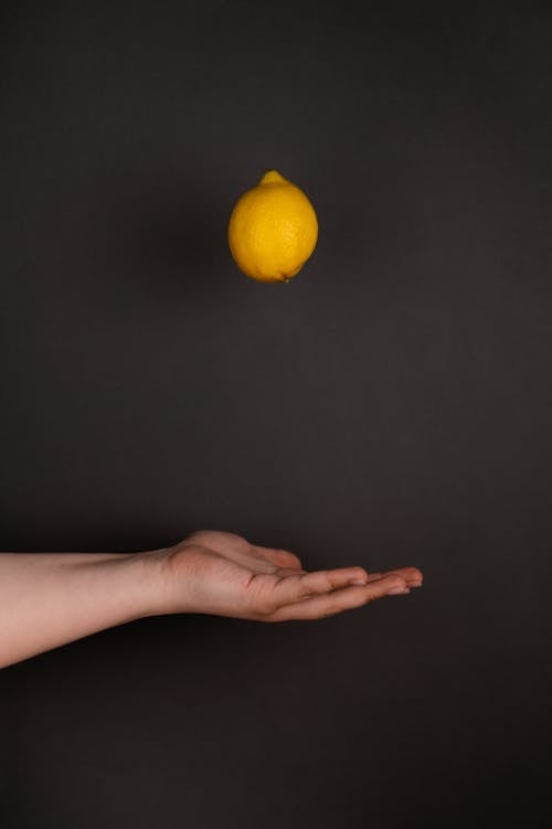 Lemon Floating on Black Background