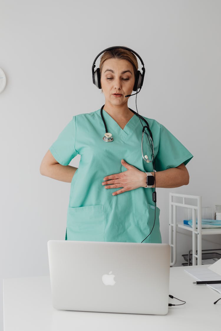 A Female Doctor Having A Video Call