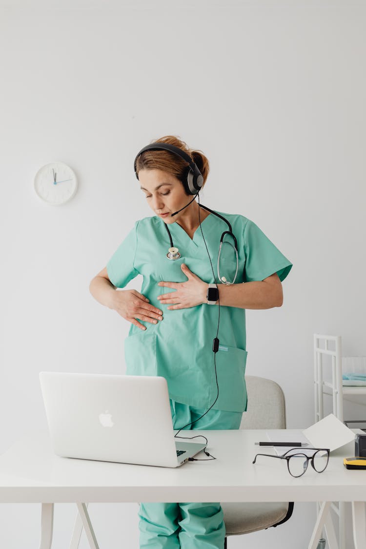 A Female Doctor Having A Video Call