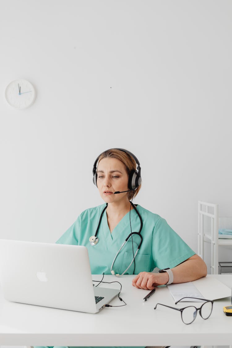 A Female Doctor Having A Video Call