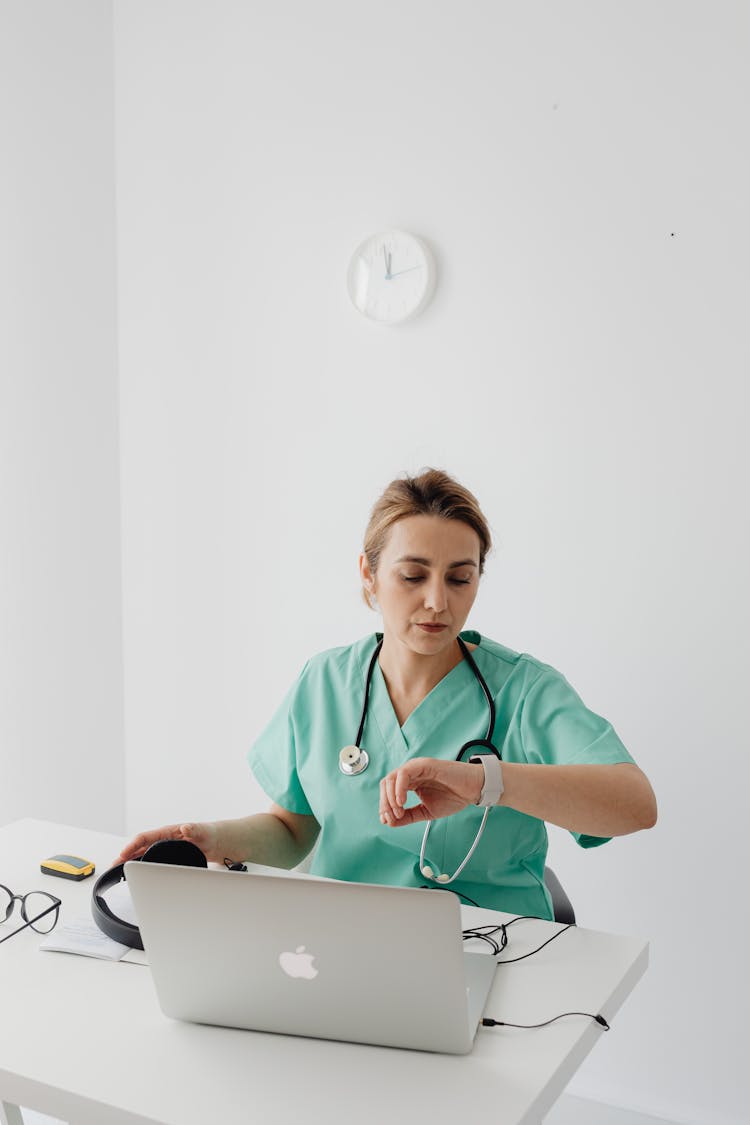 A Female Doctor Having A Video Call