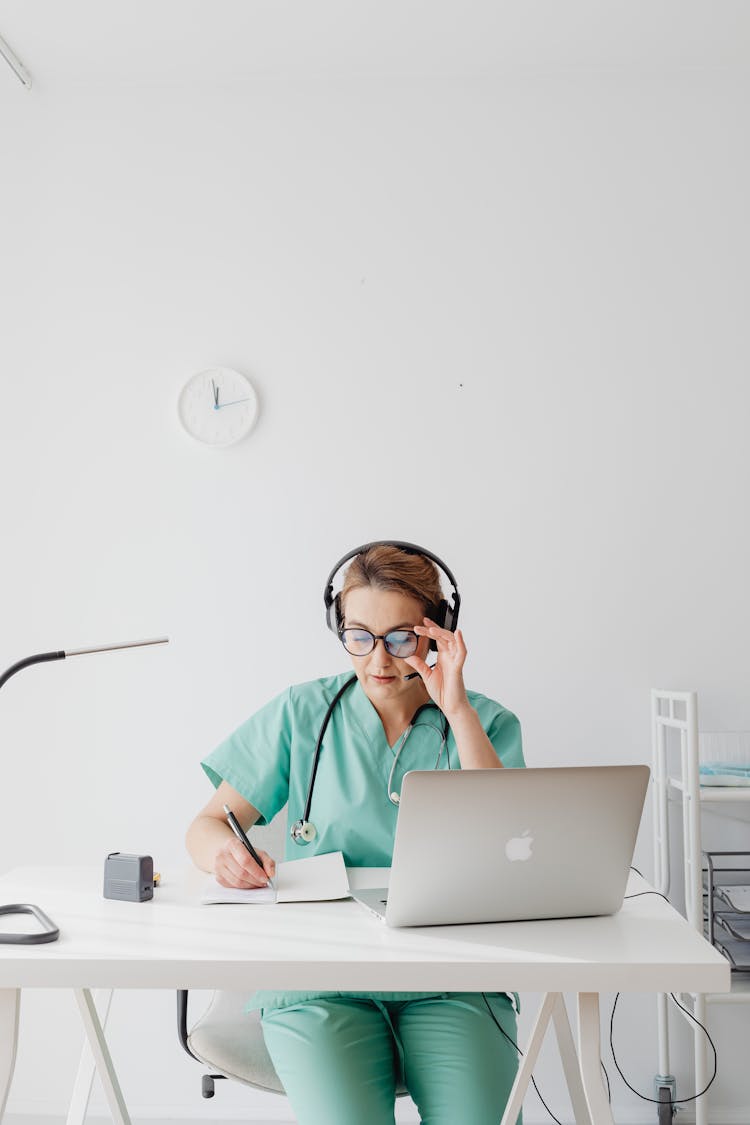 A Female Doctor Having A Video Call