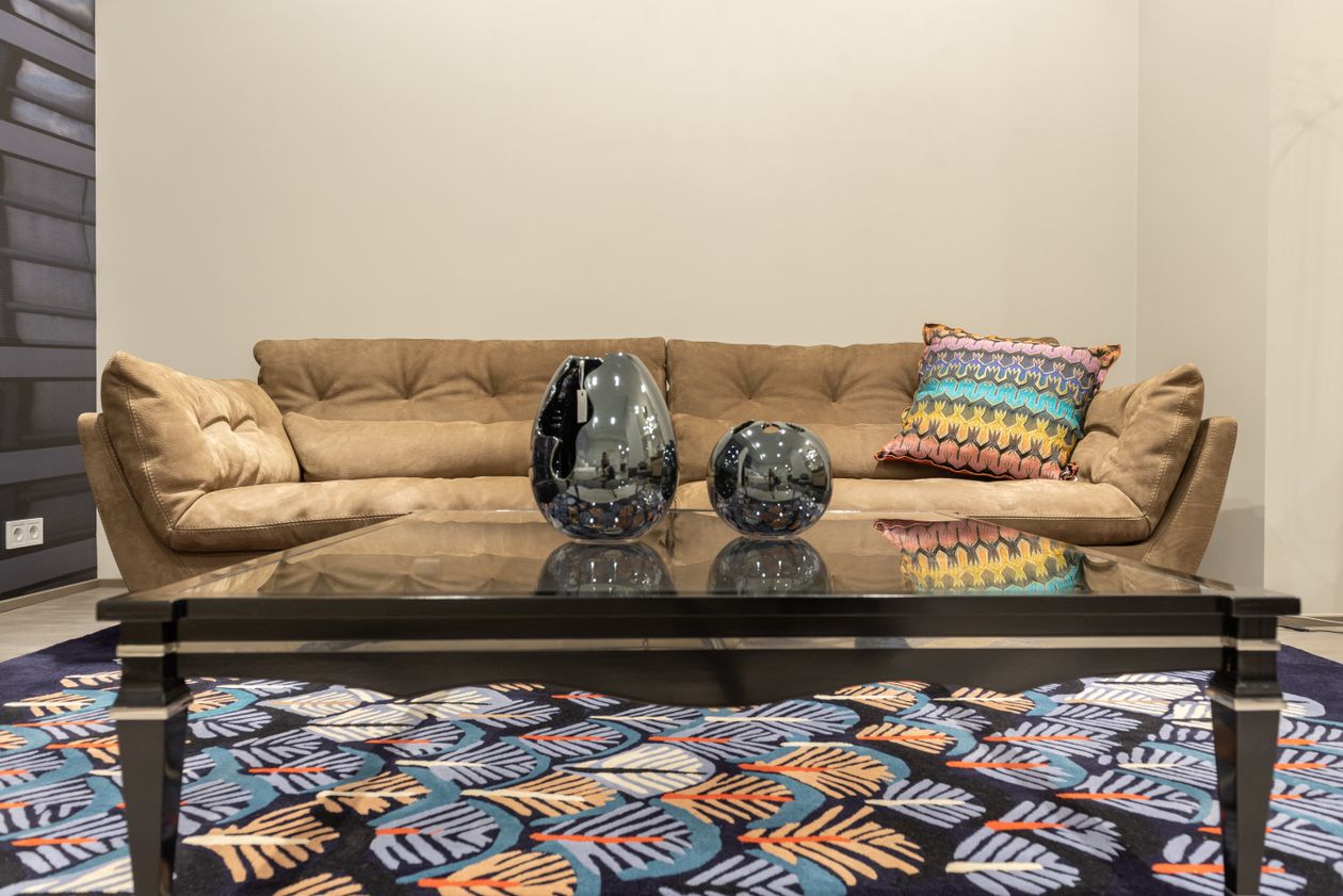 Vivid living room with bold pillows on a bright couch