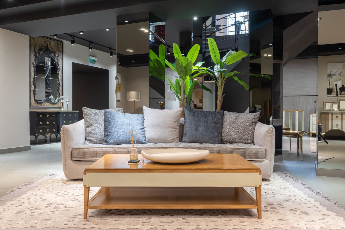 Modern living room furniture with sofa coffee table and indoor plants