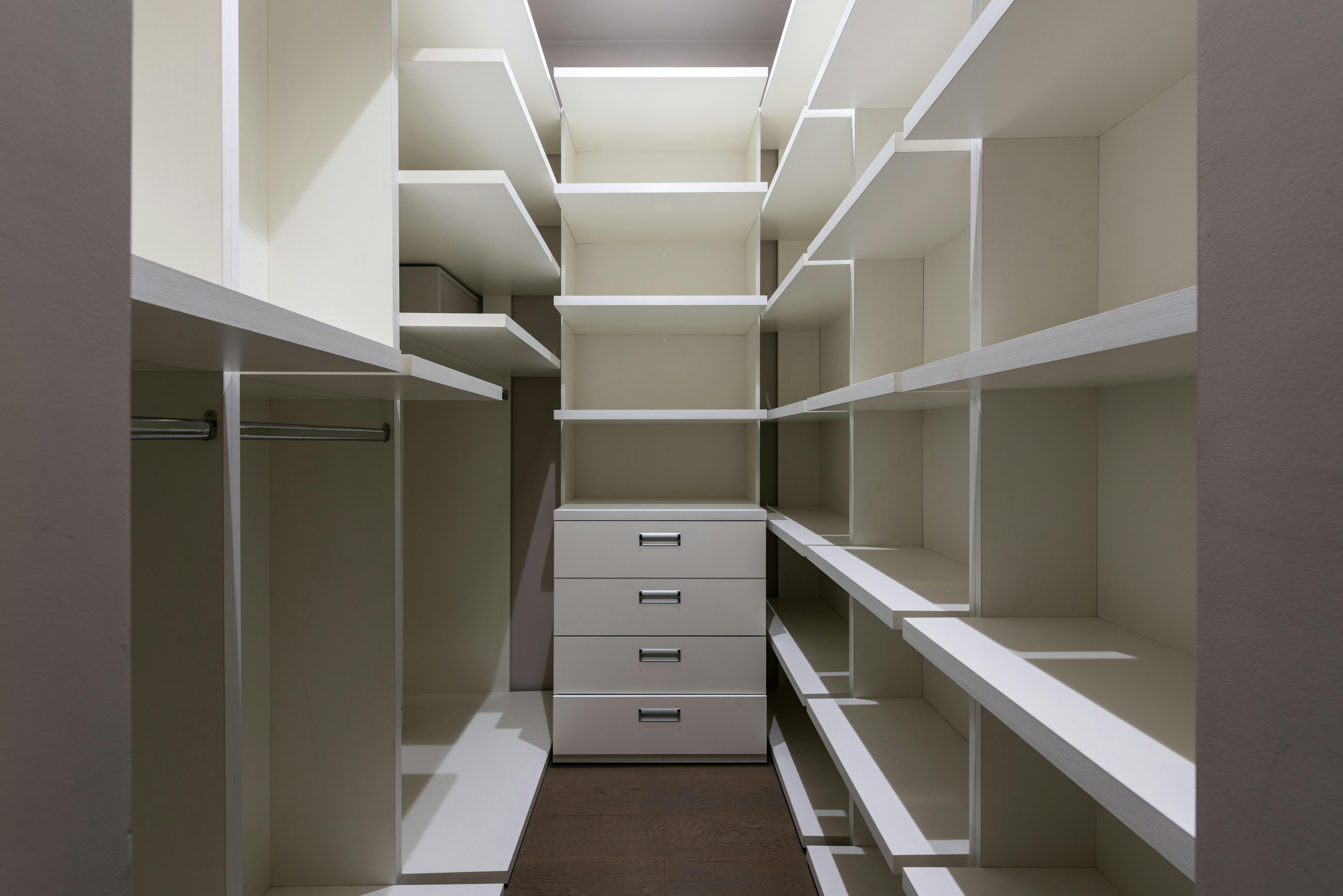 white empty shelves in wardrobe