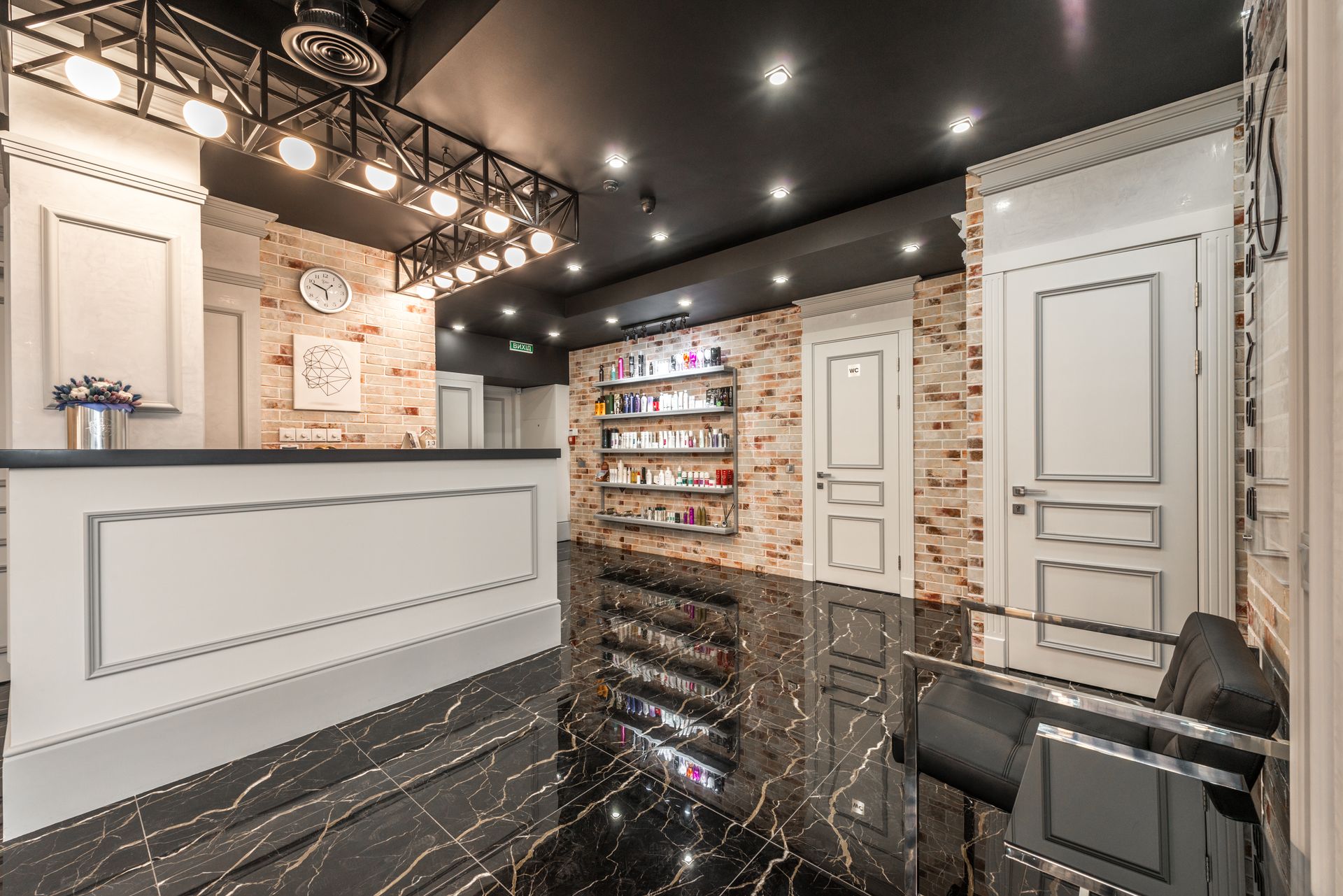 Warm reception area at Maison Belle salon