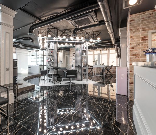Salon interior showing clean modern workstations