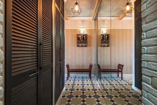 Wooden Louver Door Cabinets in the Hallway