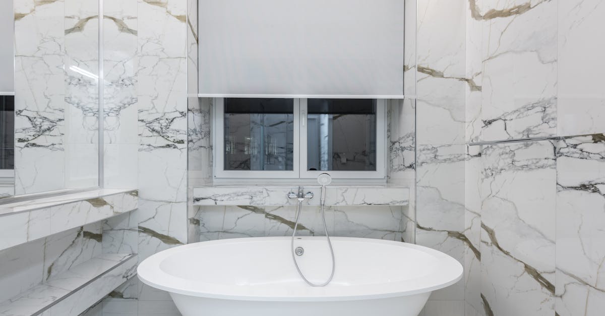 Freestanding Soaking Tub In A Stylish Bathroom Setting
