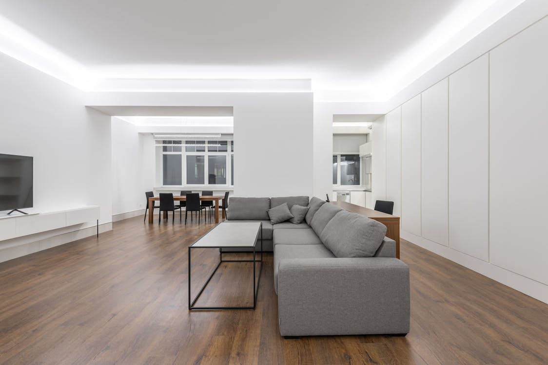 Free Spacious living room near table Stock Photo