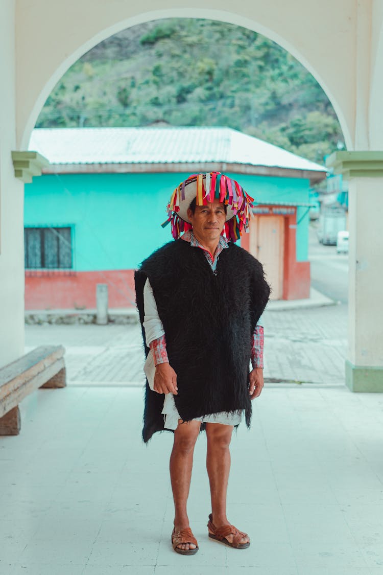 Photo Of Man Wearing Black Poncho