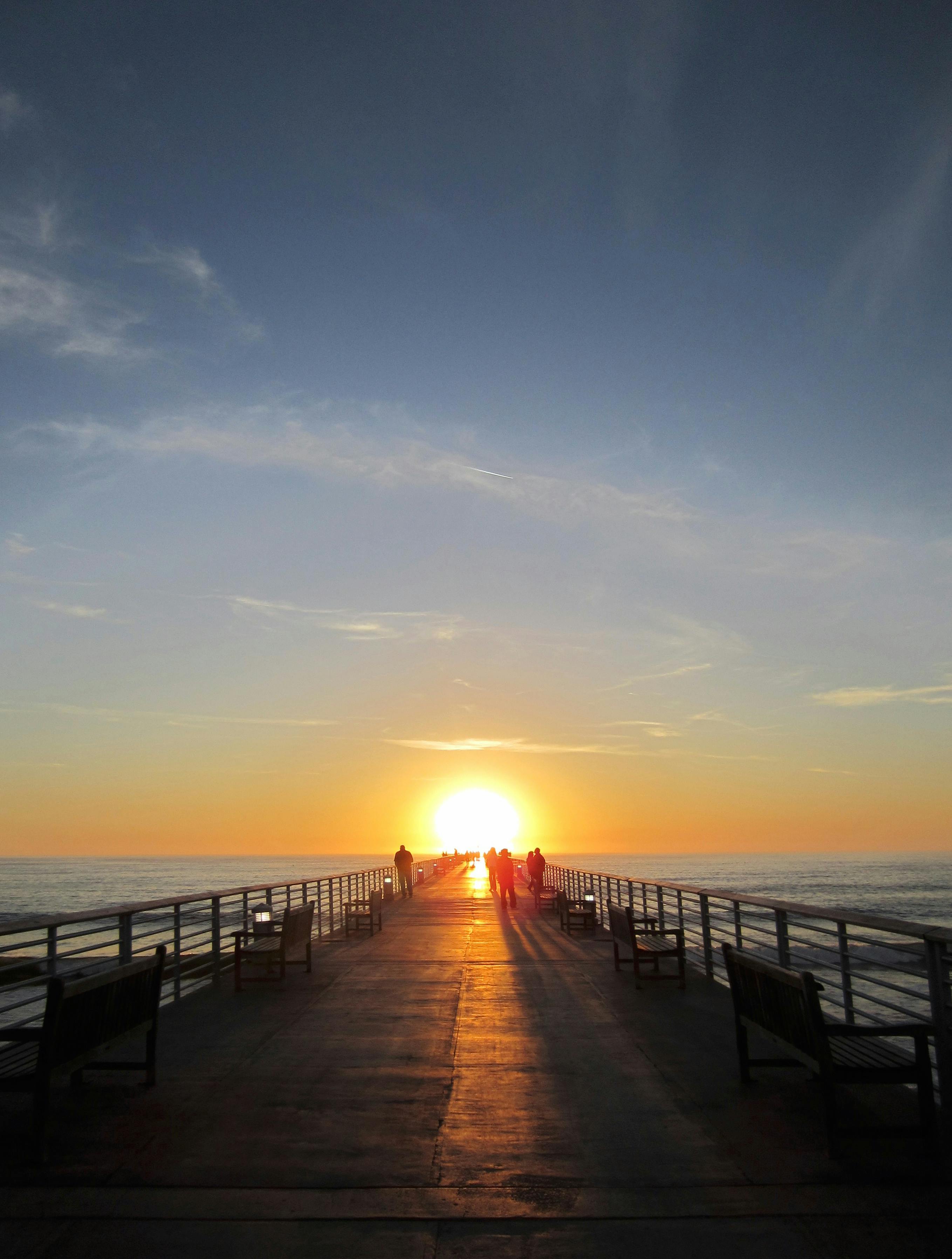 Silhouette Photography Of People On Dock During Sunset Free