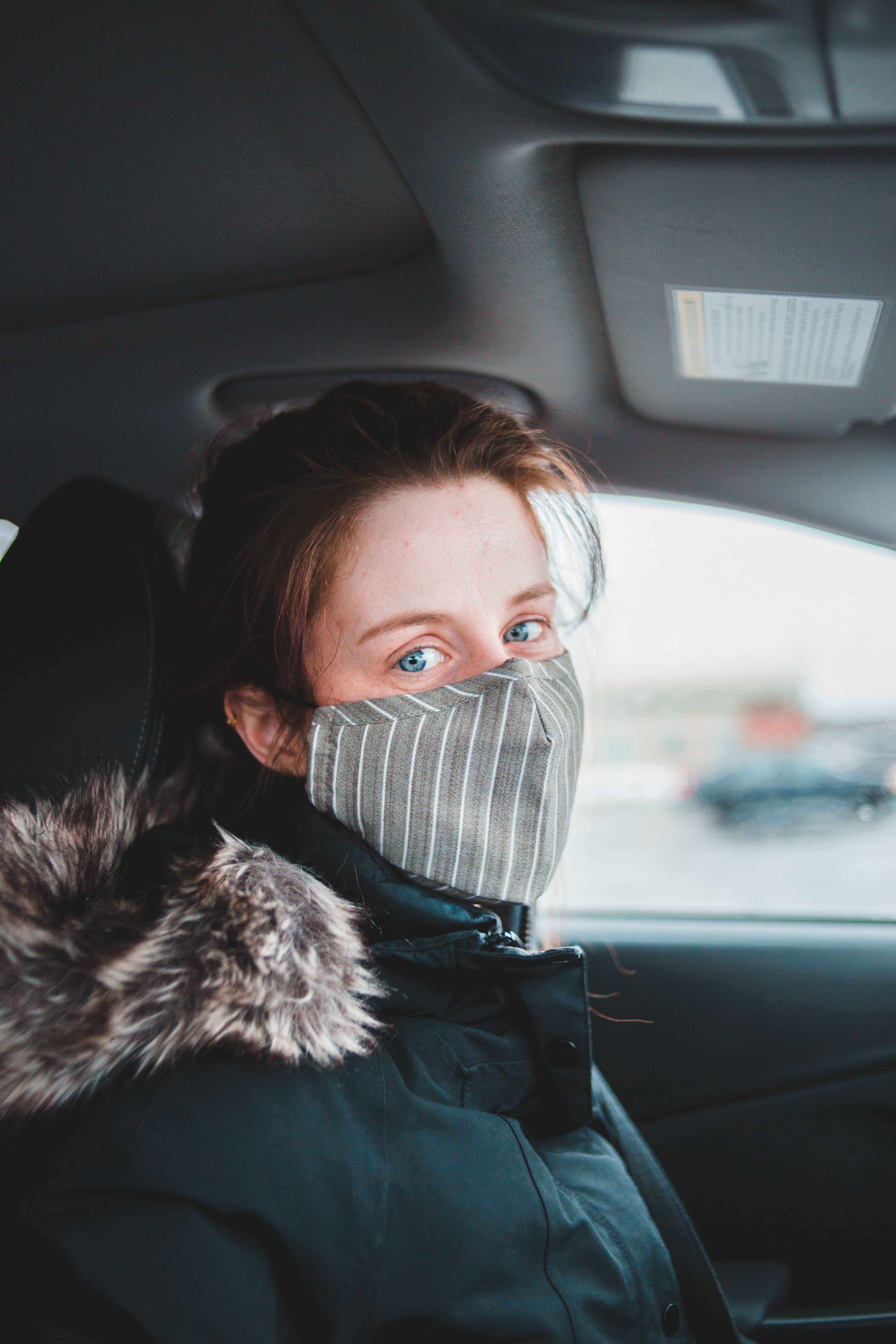 Woman in warm jacket and mask · Free Stock Photo