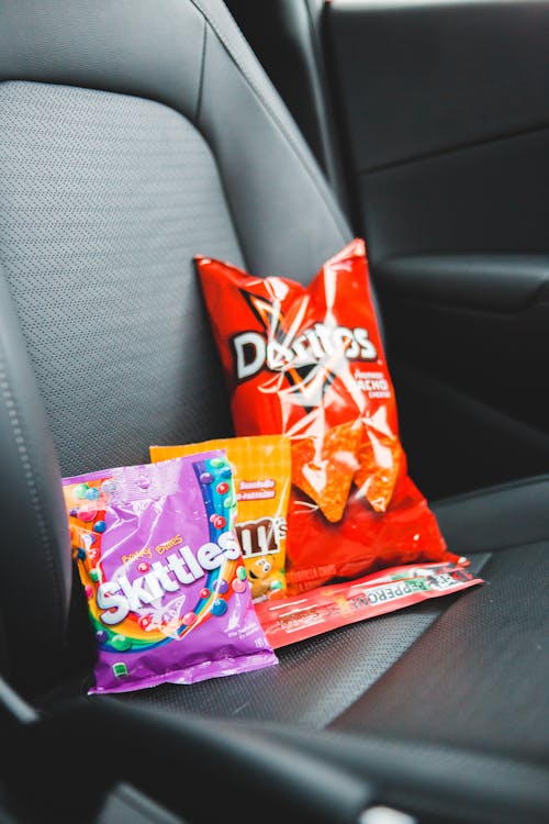 Set of various snacks in car
