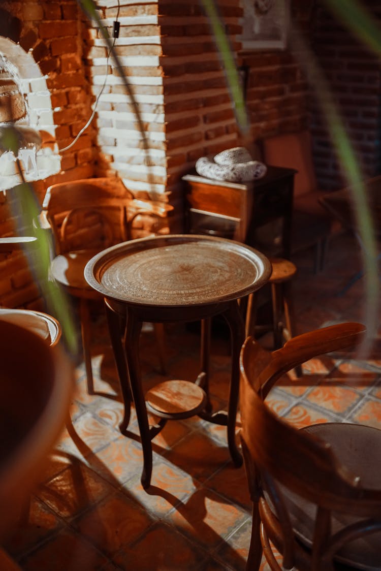 Wooden Table And Stools In Pub