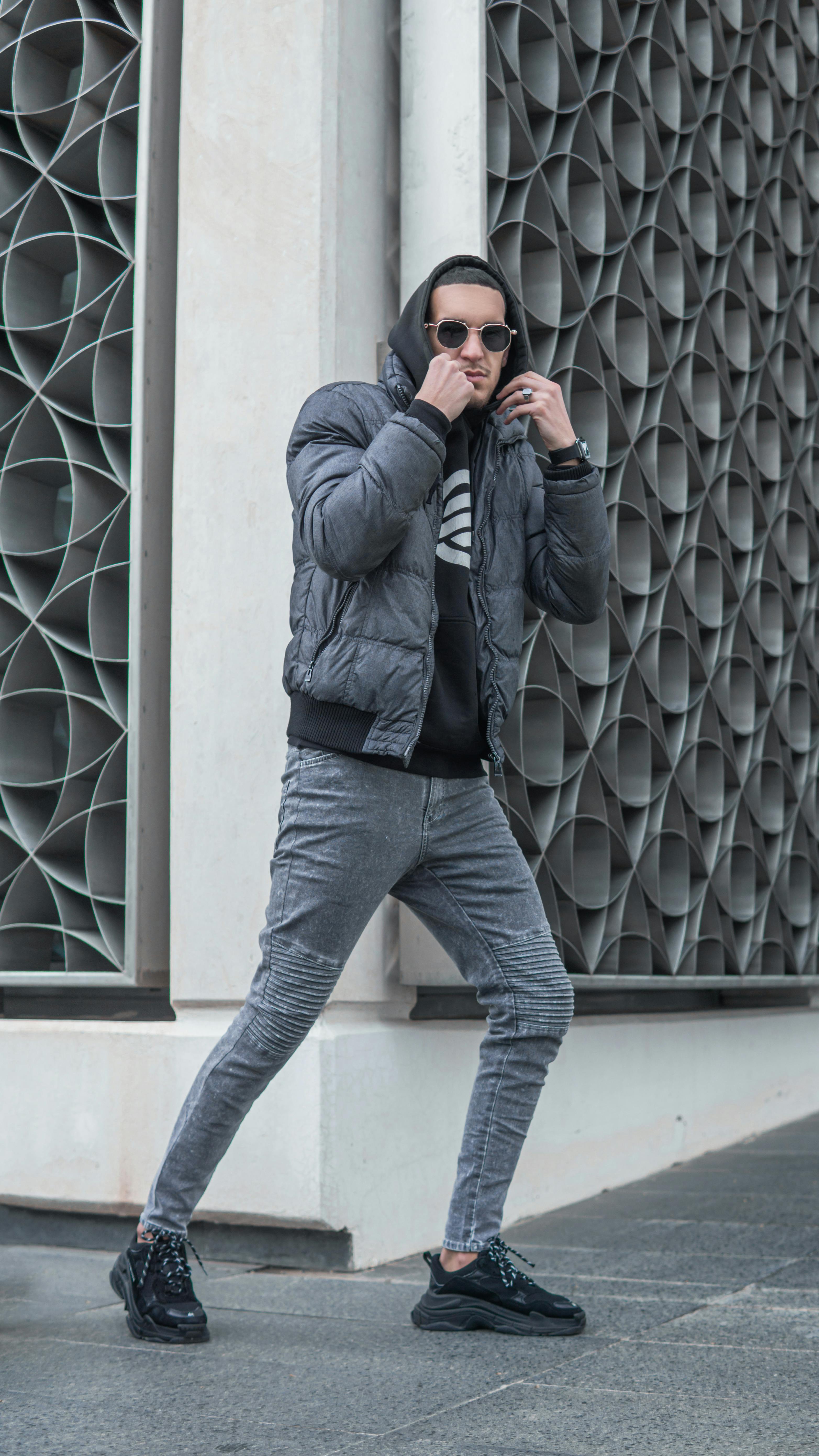 Man in Gray Puffer Jacket Wearing Sunglasses · Free Stock Photo