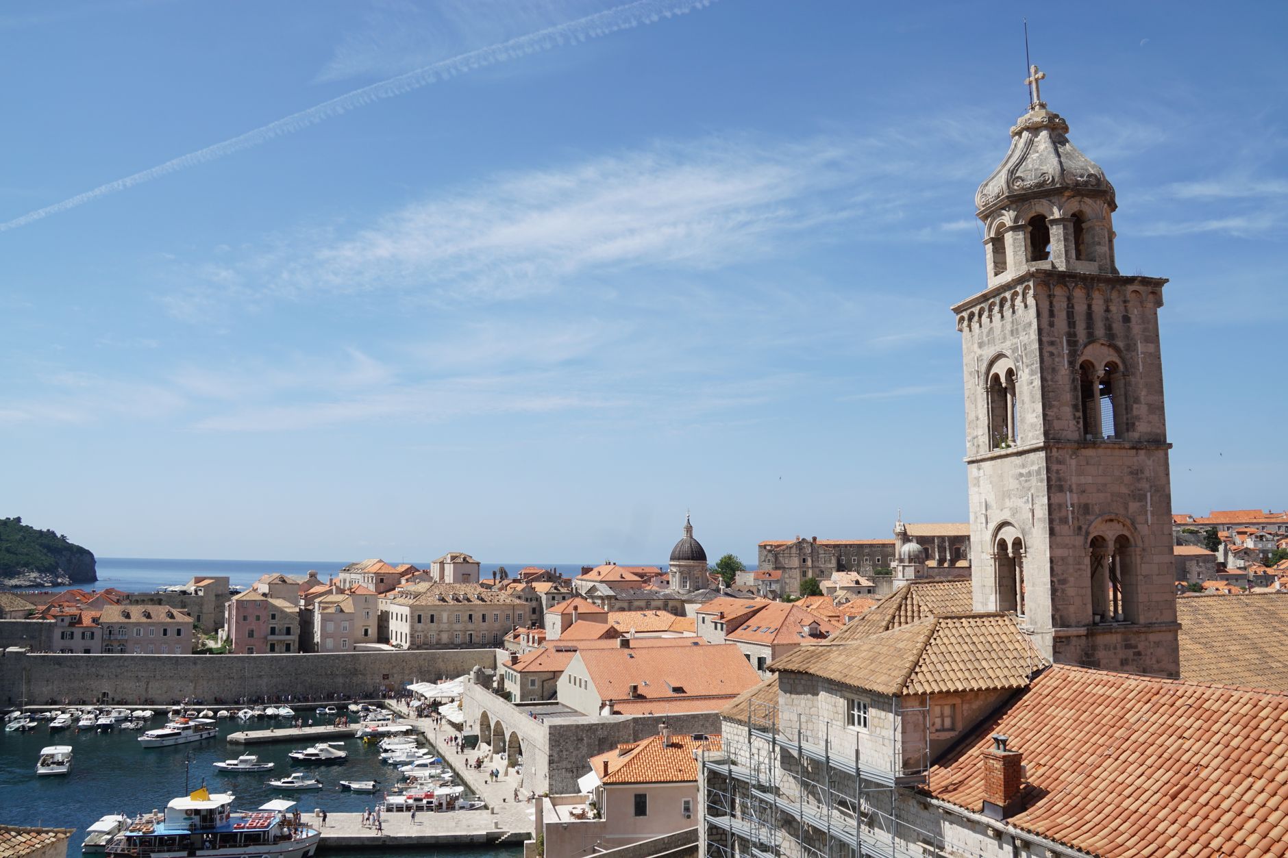15 cheap things to do dubrovnik croatia 2 A breathtaking view of Dubrovnik's historic old town with its iconic tower and marina.