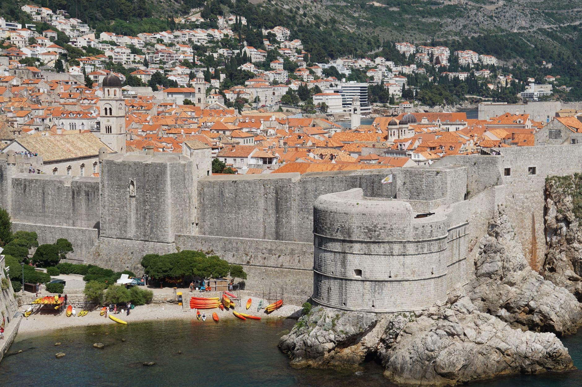 Children swimming and playing in a small cove near Dubrovnik