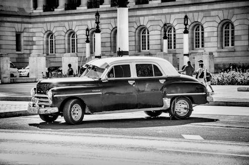 Grayscale Photo of Classic Chevrolet Sedan