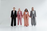 3 Women and 2 Men Standing on White Floor