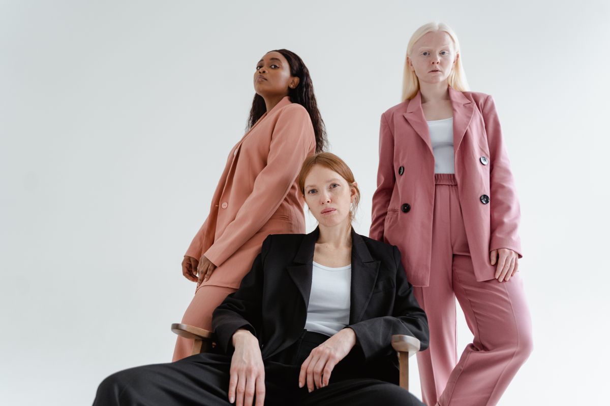 woman modeling a structured blazer outfit for curvy professional styling