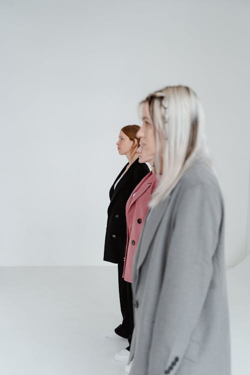 Woman in Blazer Standing Side by Side