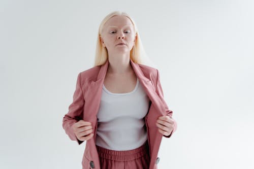 Woman Wearing a White Tank Top and a Blazer