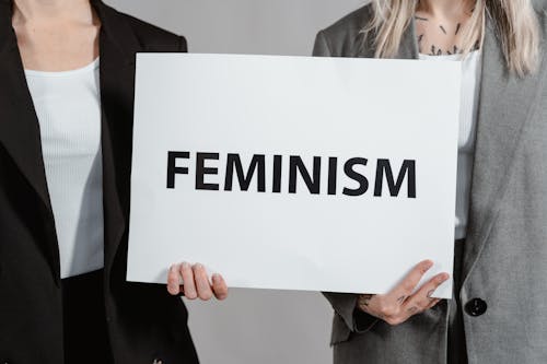 Free Women Holding Feminism Postcard  Stock Photo