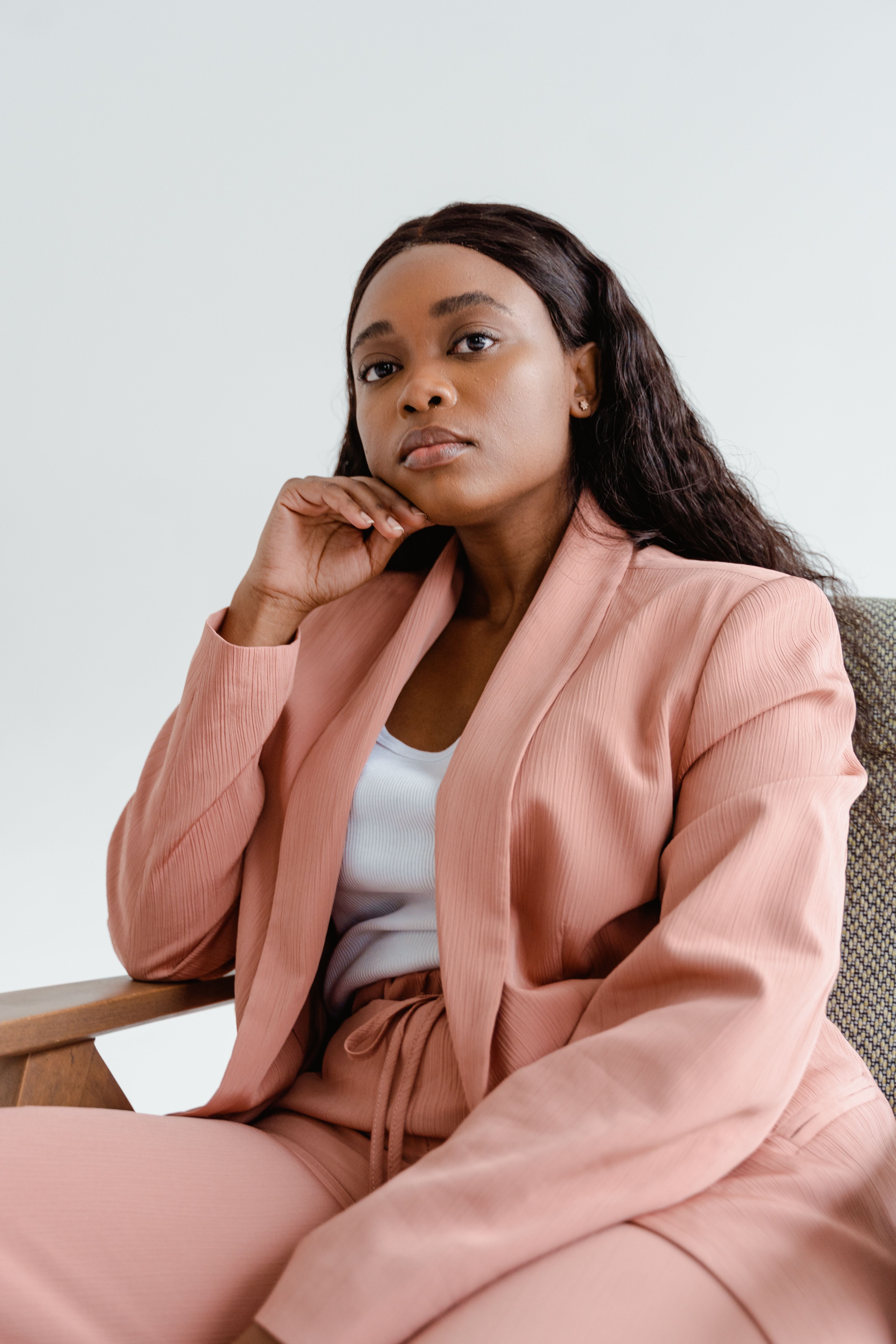 Woman in pastel power suit