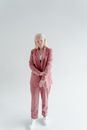 Woman in Pink Blazer and Pink Pants