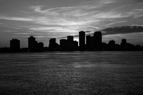 Free Grayscale Photo of Waterfront City Buildings Stock Photo