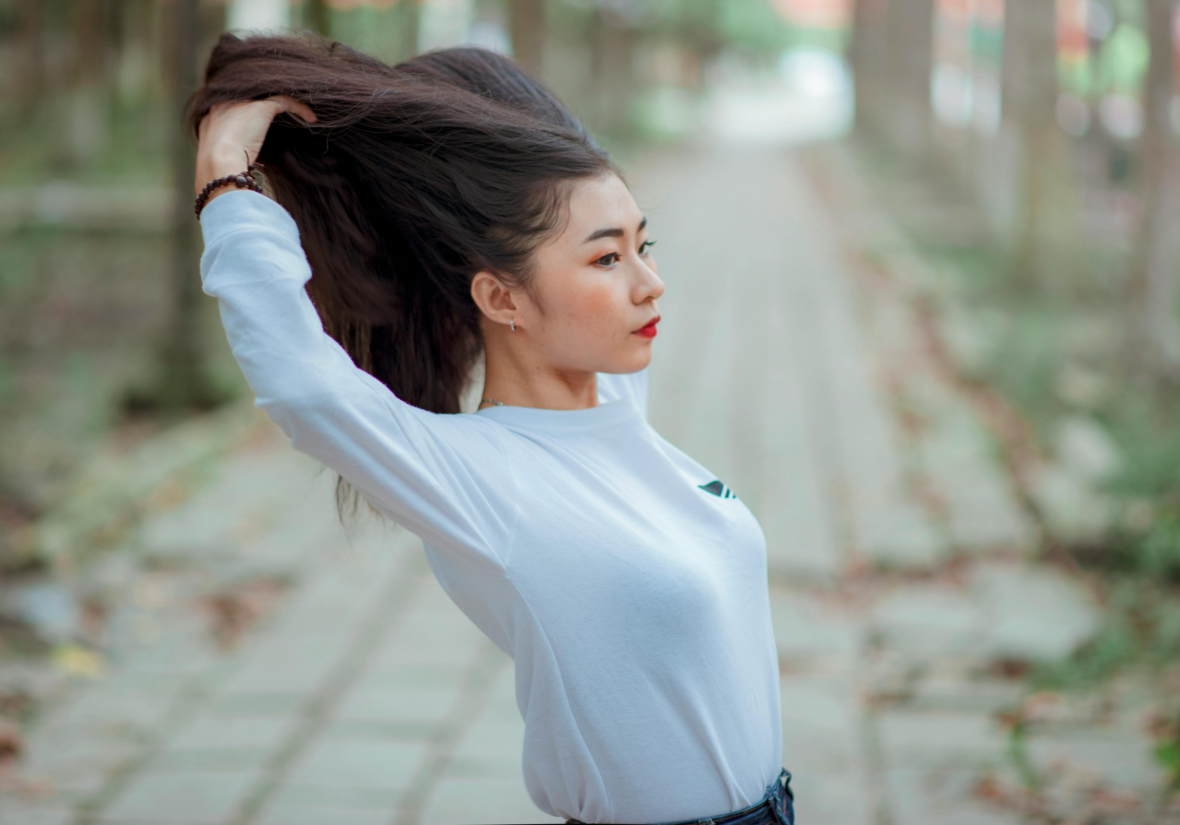Woman in Black Winter Jacket Near Trees · Free Stock Photo Woman in Black Winter Jacket Near Trees · Free Stock Photo