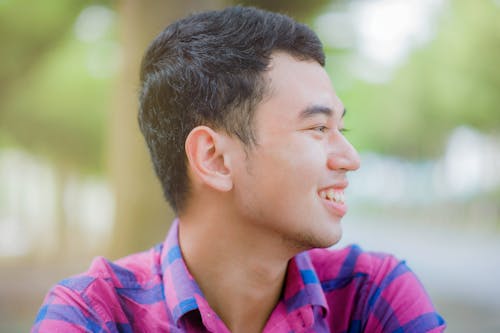 Man Facing Side on Selective Focus Photography