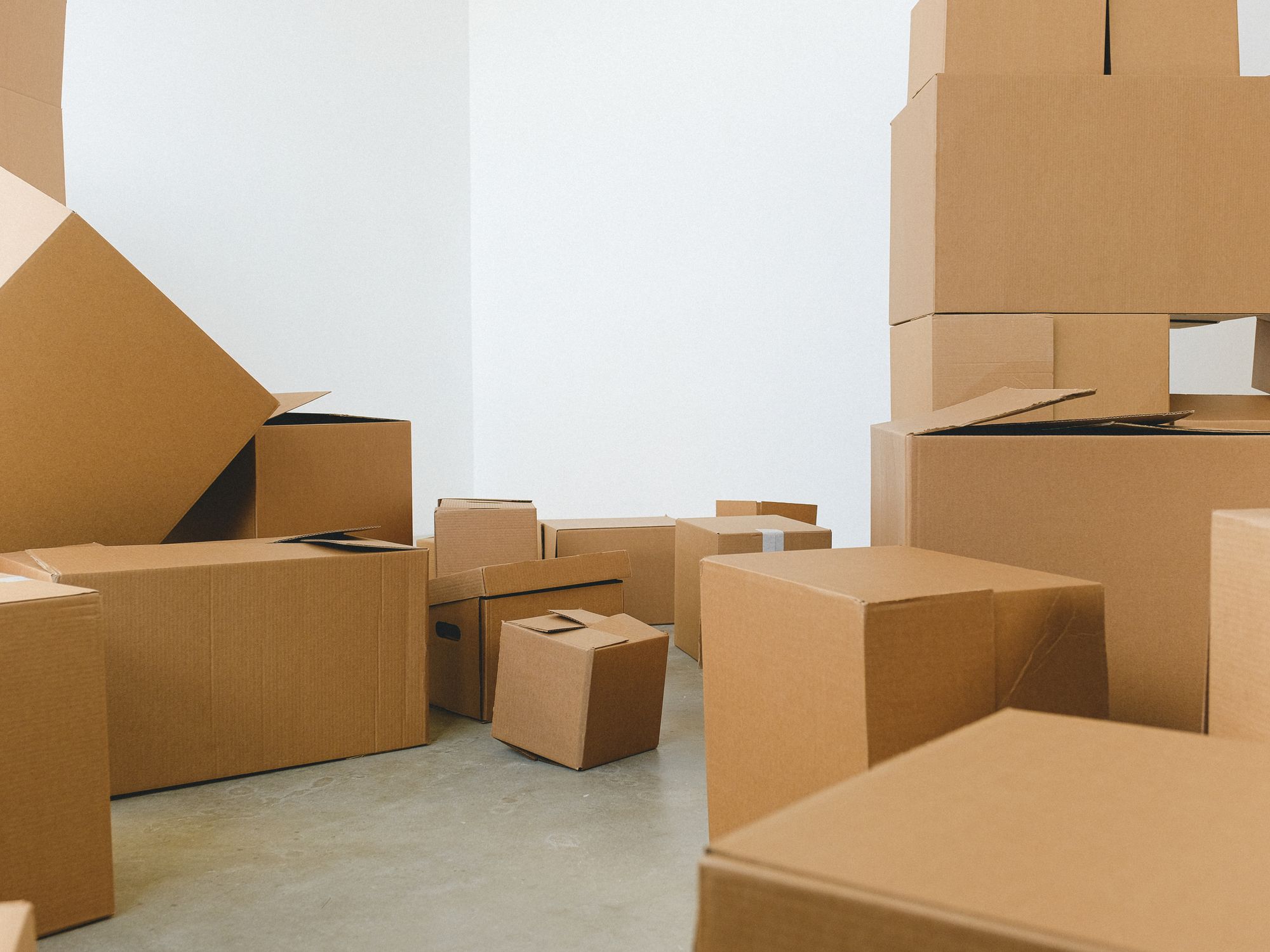 Packing & Materials in Wiveliscombe, West Midlands — professional packers wrapping and boxing belongings
