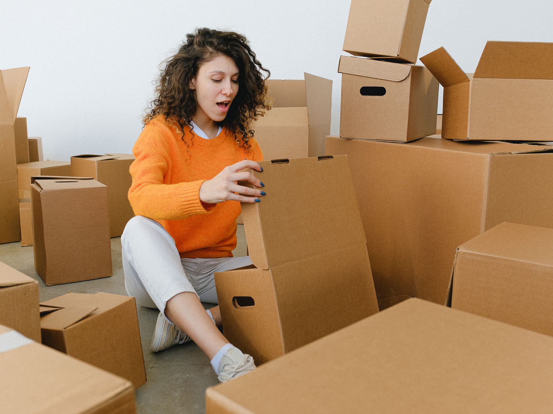 Cross Hands — professional packers wrapping and boxing belongings