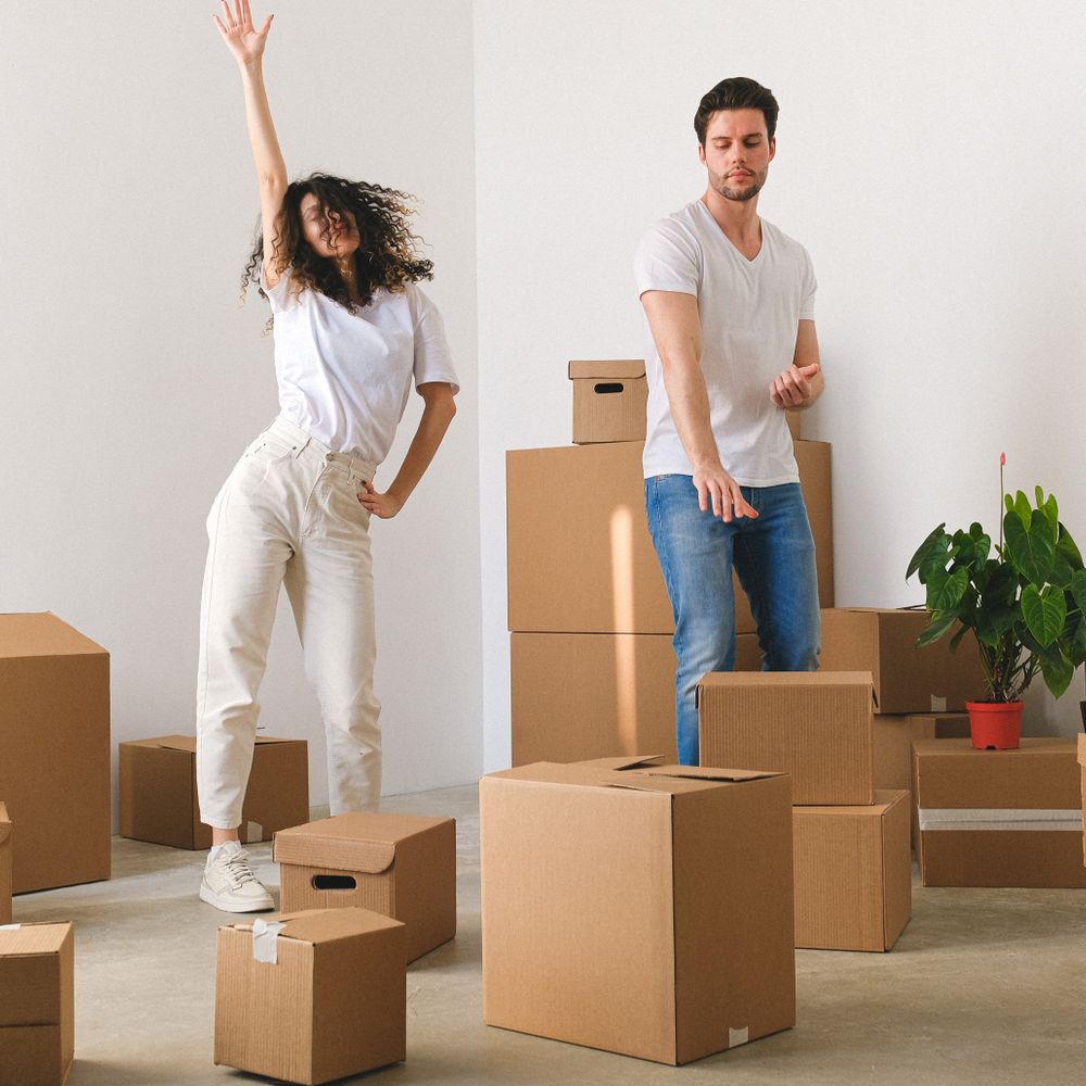 Flushing — professional packers wrapping and boxing belongings