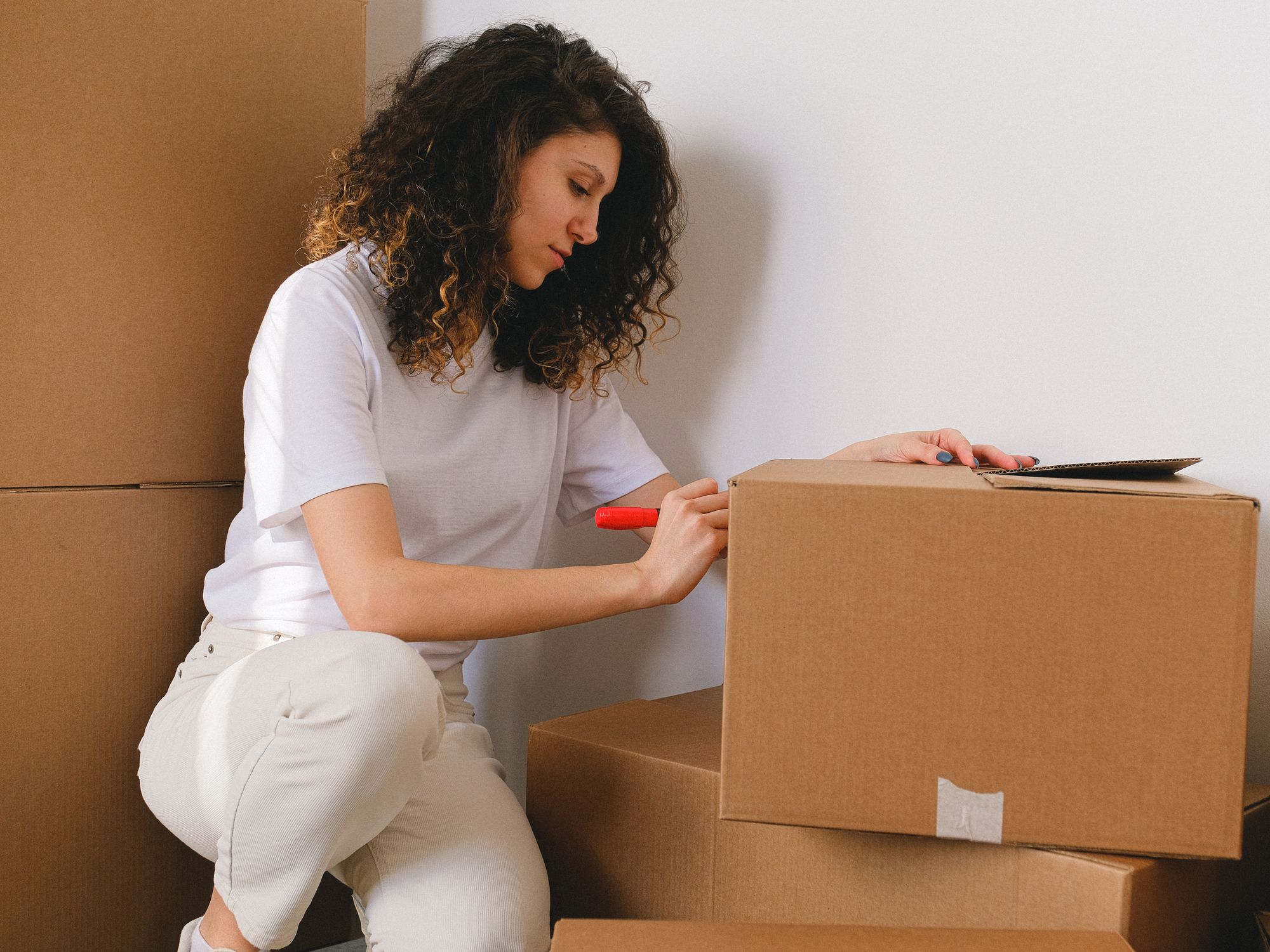 Flat Removals in Staveley, East Midlands — movers carrying boxes for a flat move