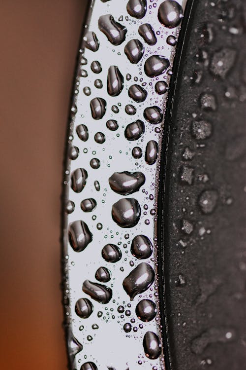 Free Water drops on metal surface in daylight Stock Photo