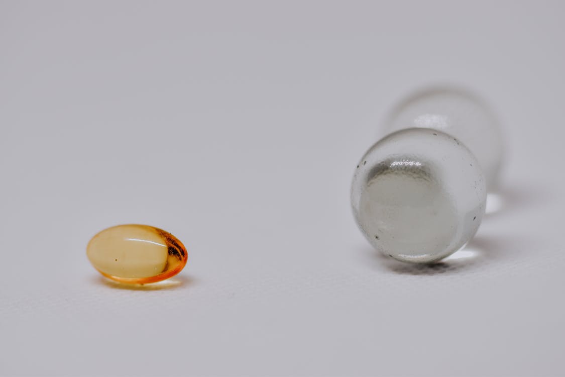 Small glass marbles on white surface