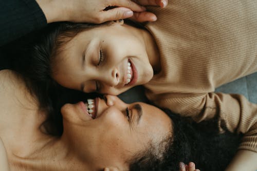 Woman and Child Lying Together