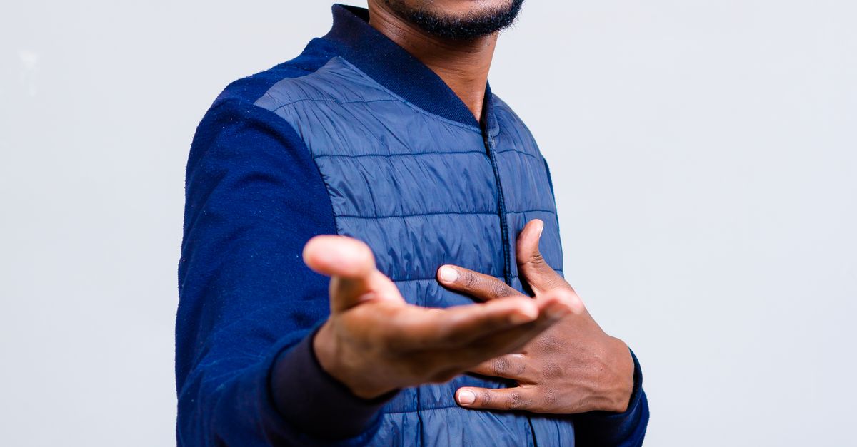 Man Taking Photo Using One Hand Smiling Man Holding One Hand on His Chest and Reaching the Other One ...