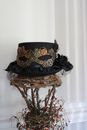 A Black Hat with Watch Parts Design