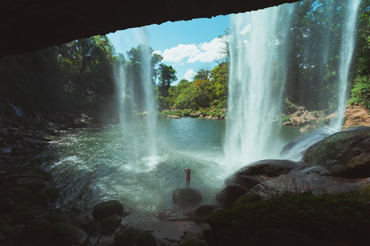 A Waterfall Plunging In A River